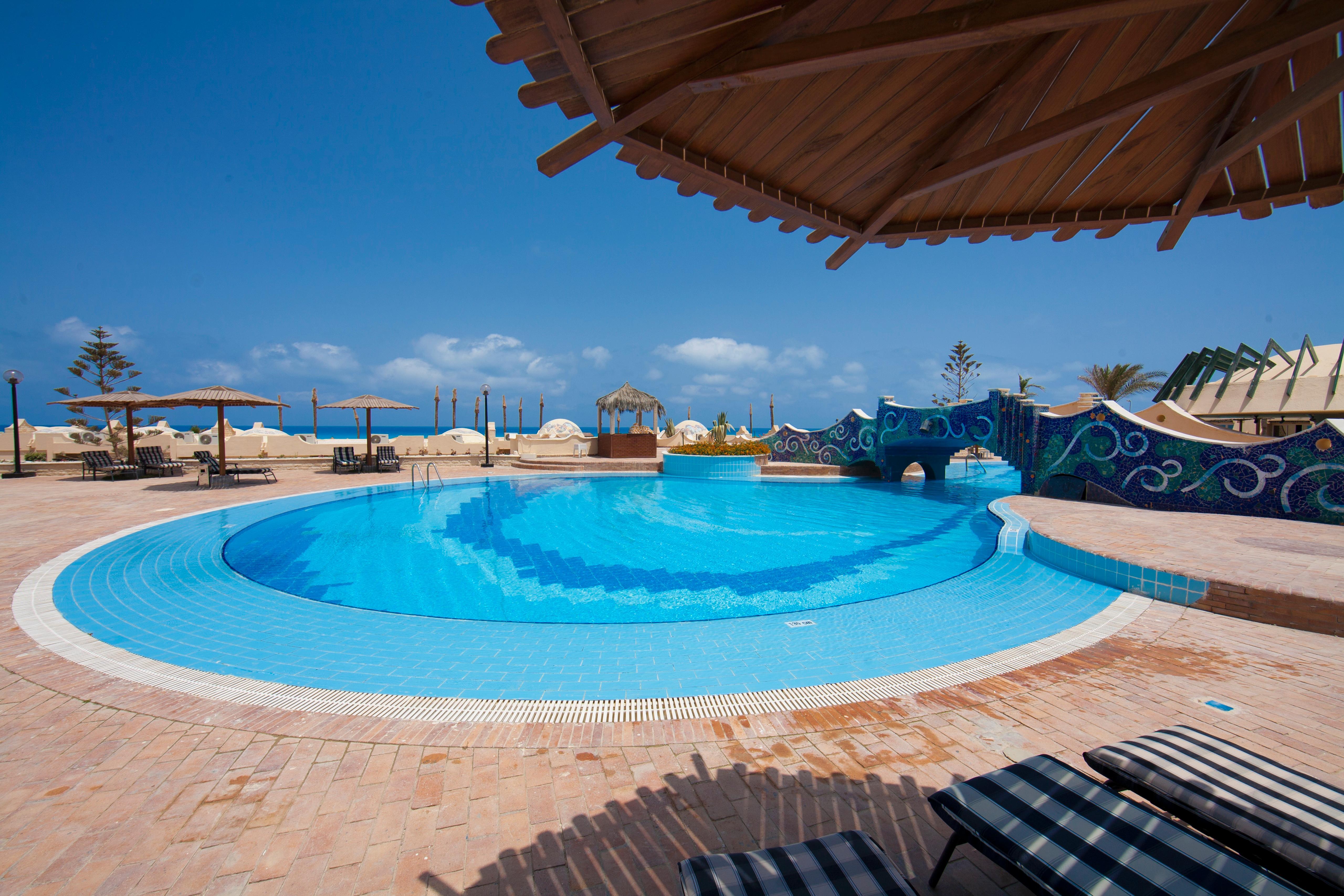 Borg El Arab Beach Resort Exterior photo The swimming pool at the Dead Sea Spa Magdala